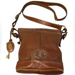 Fossil Maddox cognac leather bucket crossbody bag key charm vintage